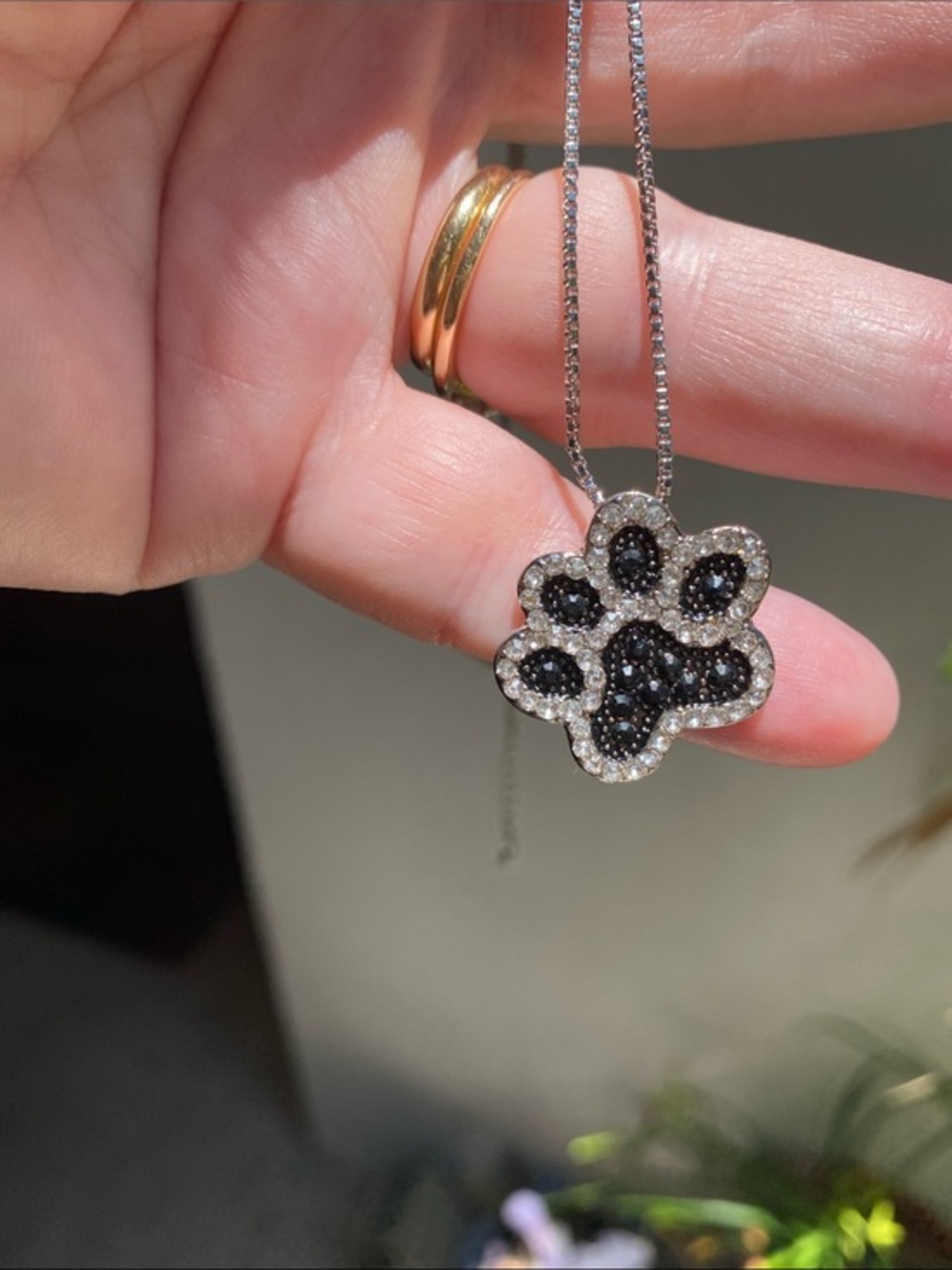 Paw Print Pendant Necklace in Black and Silver